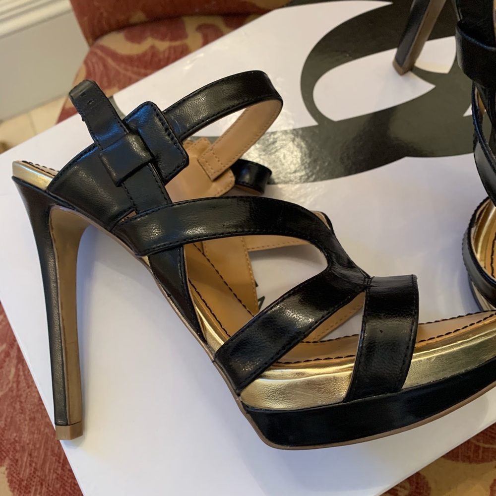 Ladies Black High strappy heels.  Size 6.5 $25